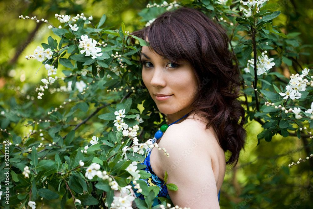 tender girl in the garden with flowerings trees tender girl in the garden with flowerings trees