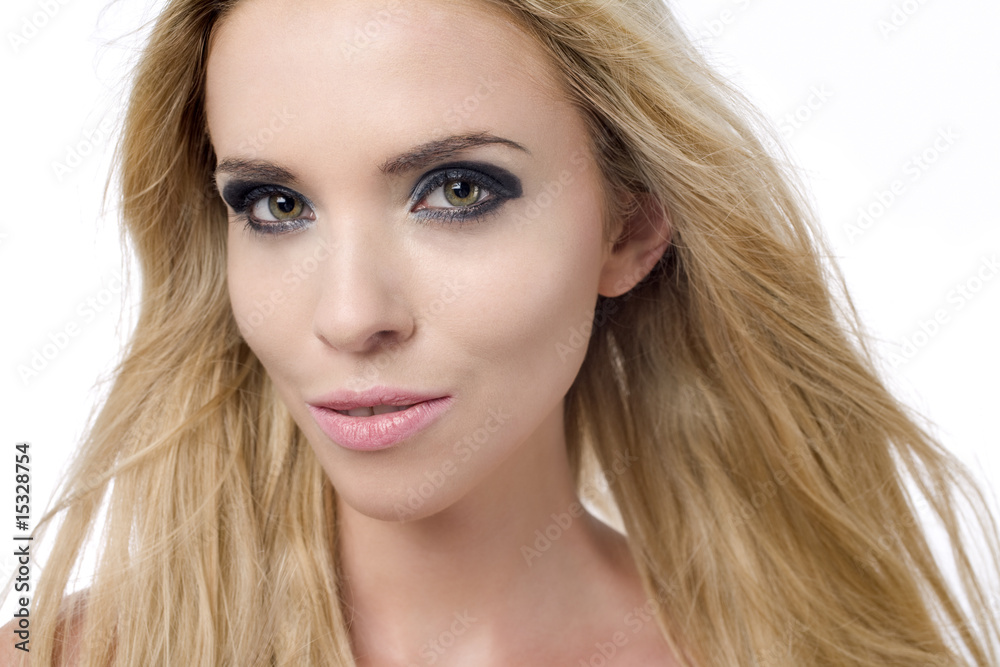 Female model on white background with flowing blonde hair Female model on white background with flowing blonde hair