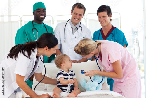 Medical team attending to a baby