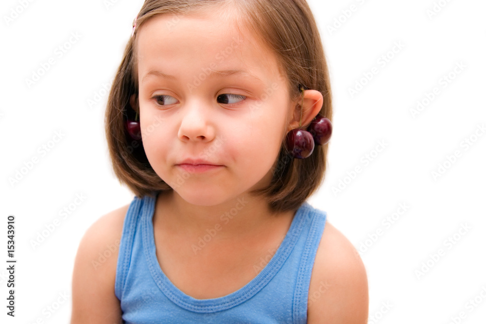 5 years old girl with cherries isolated on white 5 years old girl with cherries isolated on white