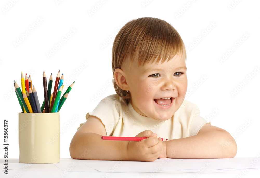 Child draw with red crayon Child draw with red crayon