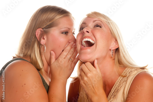Two Blonde Women Whispering...