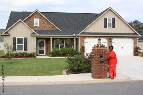 black homeowner getting the mail