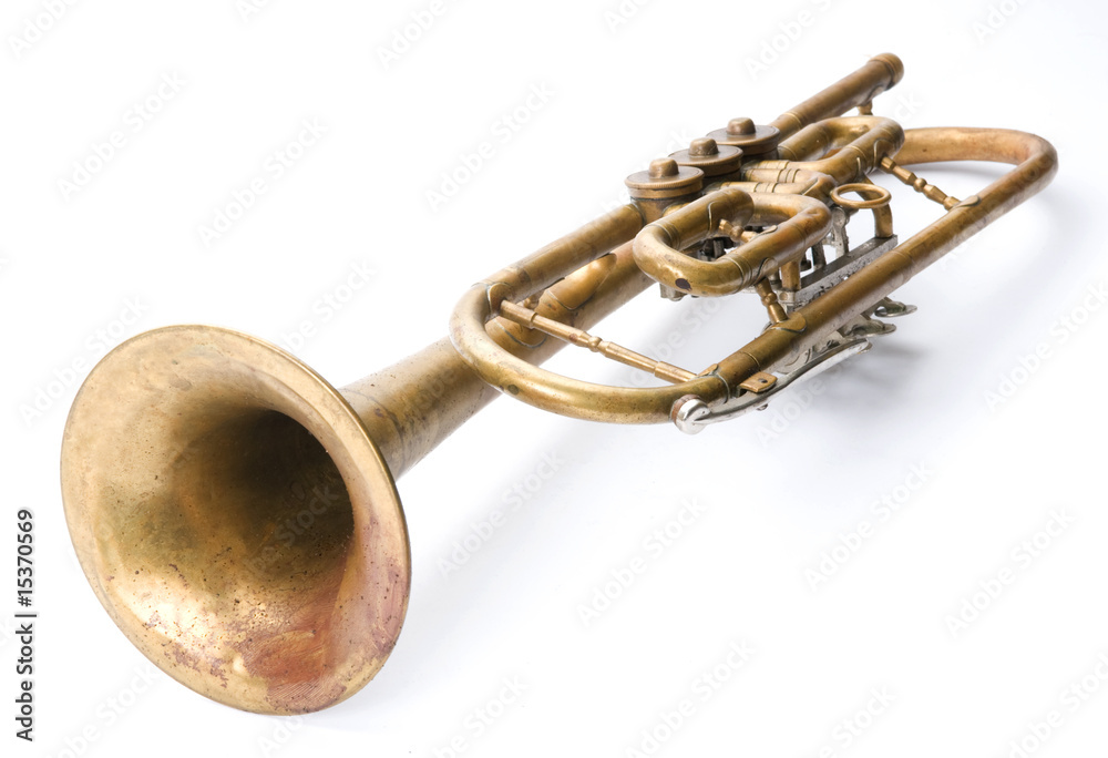 Obraz premium Old vintage trumpet isolated over white