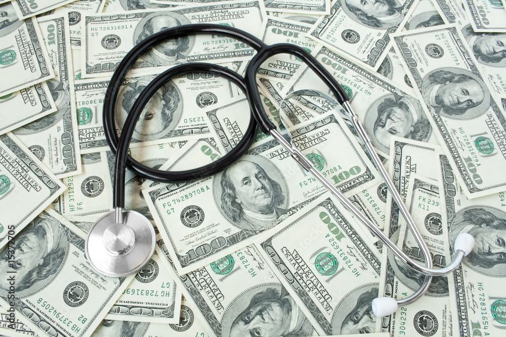 medicine. stethoscope with money medicine. stethoscope with money