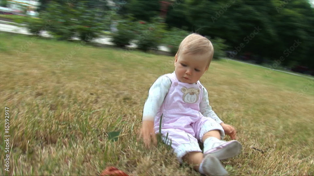 Child keep a cone. Camera flies round it Child keep a cone. Camera flies round it