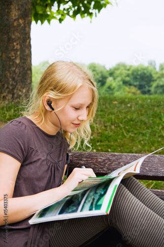 Girl, reading a magazine