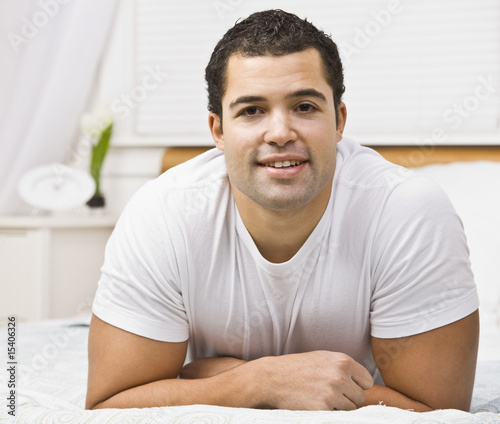 Attractive man on bed