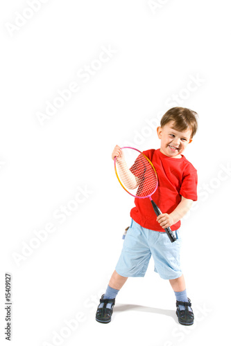 Little boy playing badminton