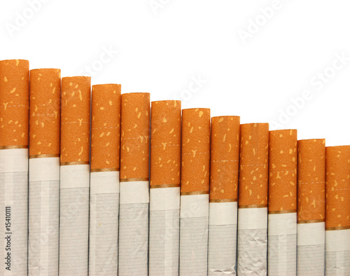 row of cigarettes on white background photo