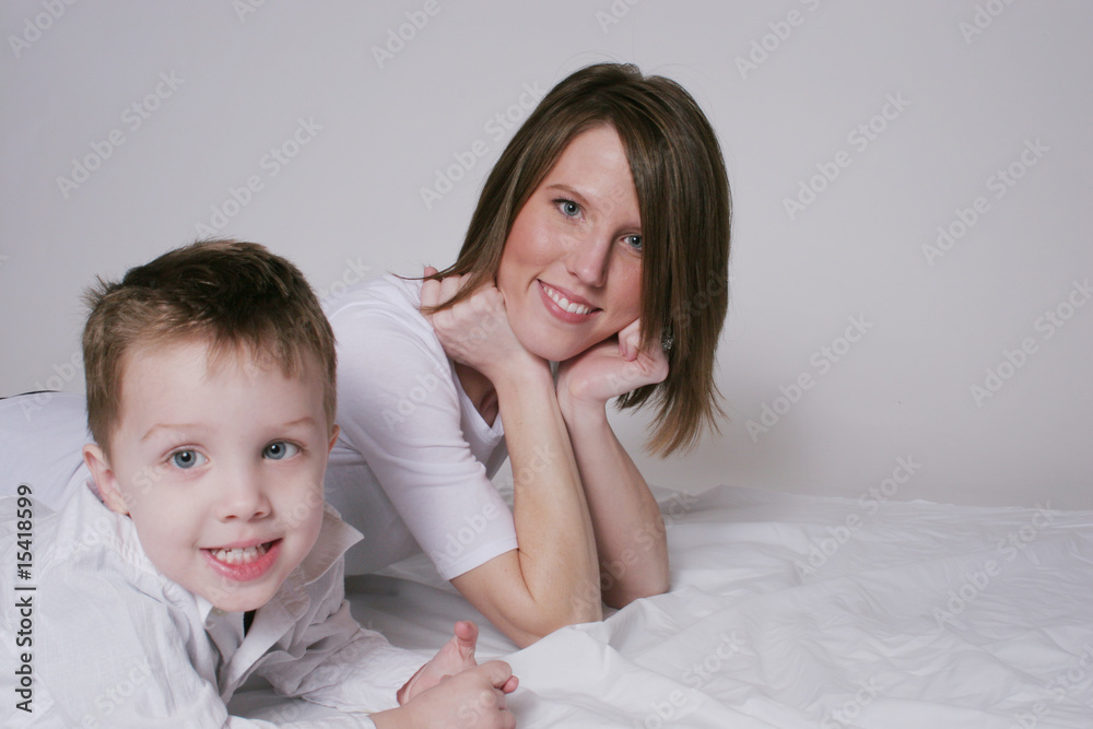 Mother and son on the floor together Mother and son on the floor together