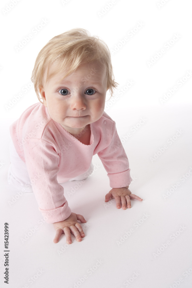 Baby girl is crawling towards the camera Baby girl is crawling towards the camera