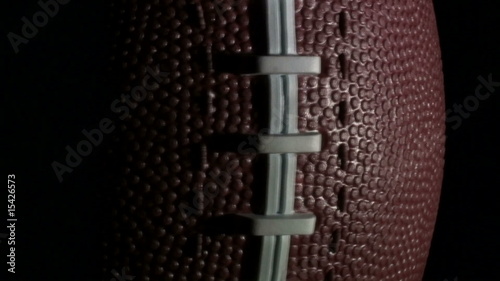 Football rotates against black - HD