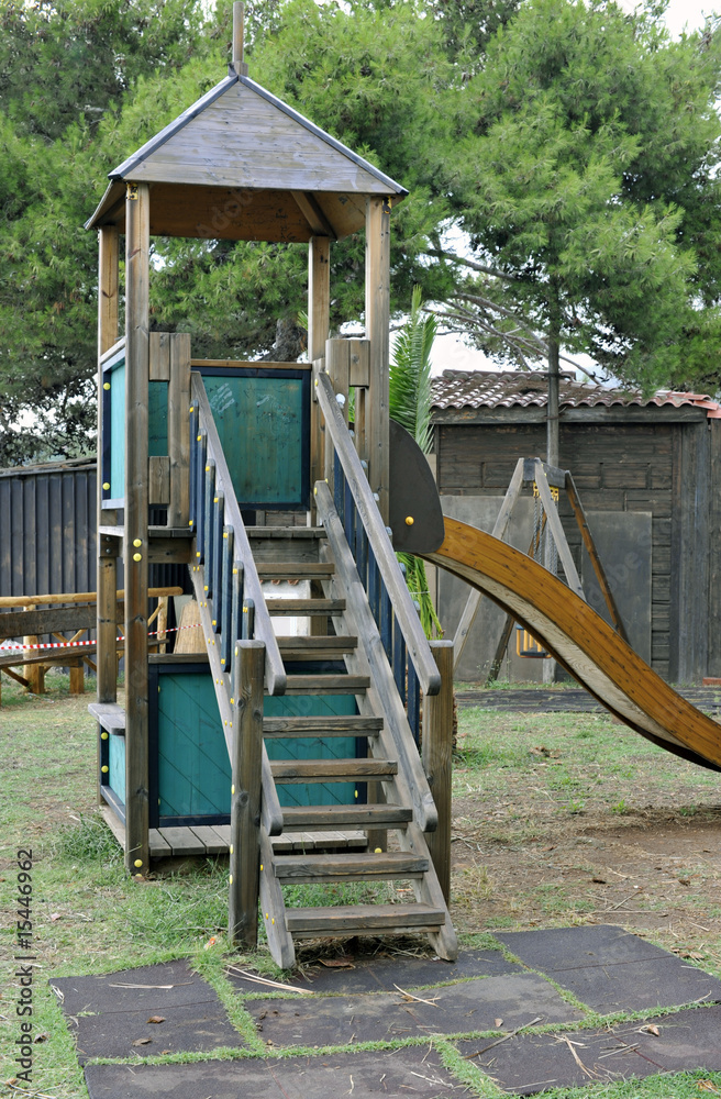 Playground wooden equipment with sliding Playground wooden equipment with sliding