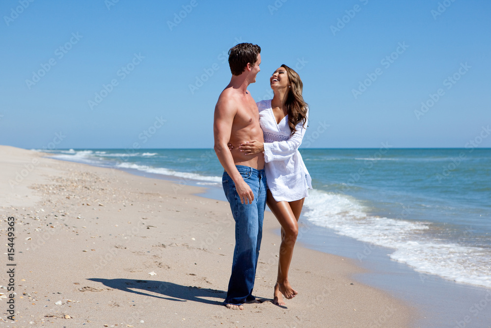 Couple having fun on a beach.