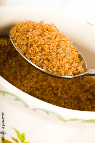 brown sugar on spoon isolated