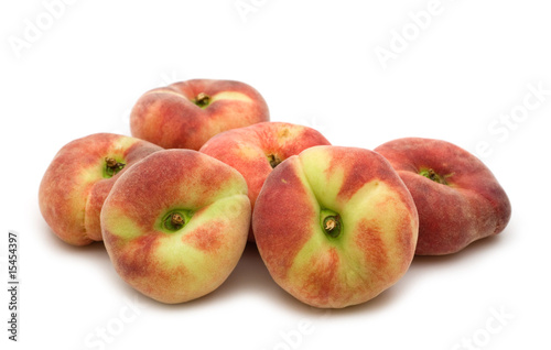 strange peaches on white background
