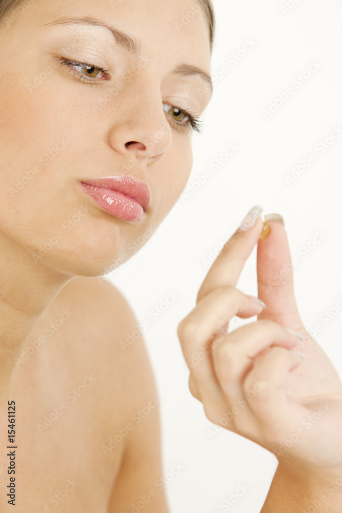 portrait of woman with vitamin E portrait of woman with vitamin E