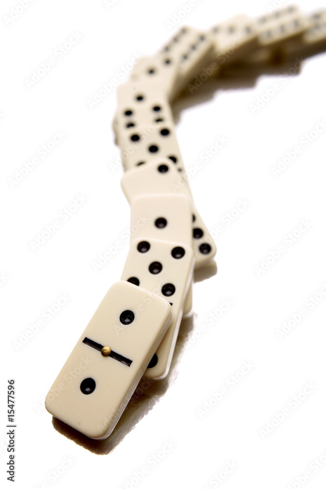 Fallen dominoes over white background Fallen dominoes over white background