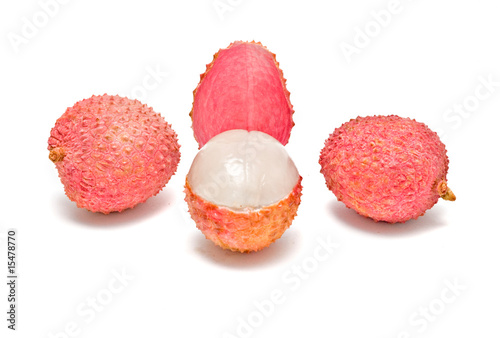 Lychees and peeled lychee isolated on white background