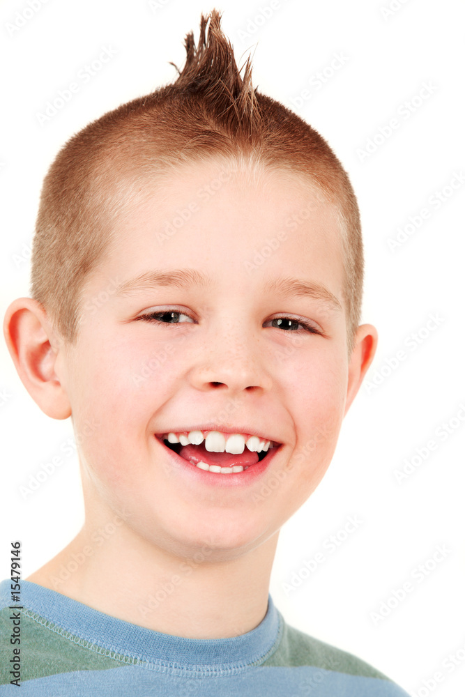 Portrait of young happy boy with mohawk, studio shot Portrait of young happy boy with mohawk, studio shot