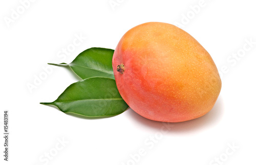Mango on leaves isolated on white background