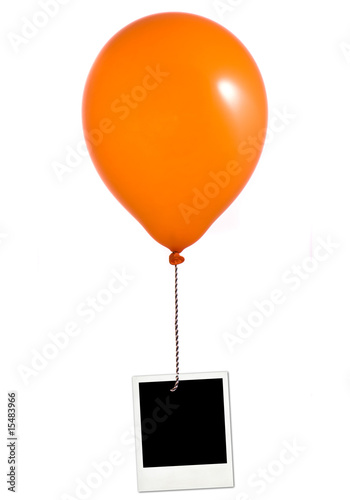 Orange balloon and photo frame on white background