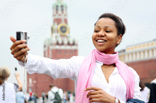 African girl photographes sights in Moscow (Russia) photo