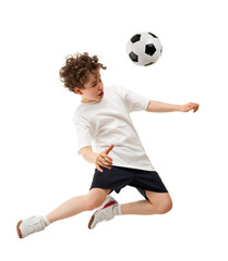 Boy playing football isolated on white background