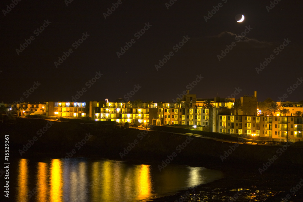 Night view of a beach with reflexes in the sea Lanzarote