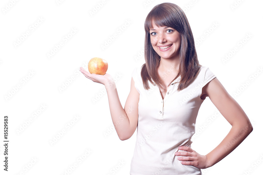 Young pretty happy woman with red and yellow apple in hand Young pretty happy woman with red and yellow apple in hand