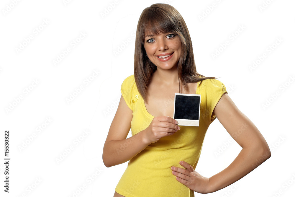 Woman holding an old polaroid film blank i Woman holding an old polaroid film blank i