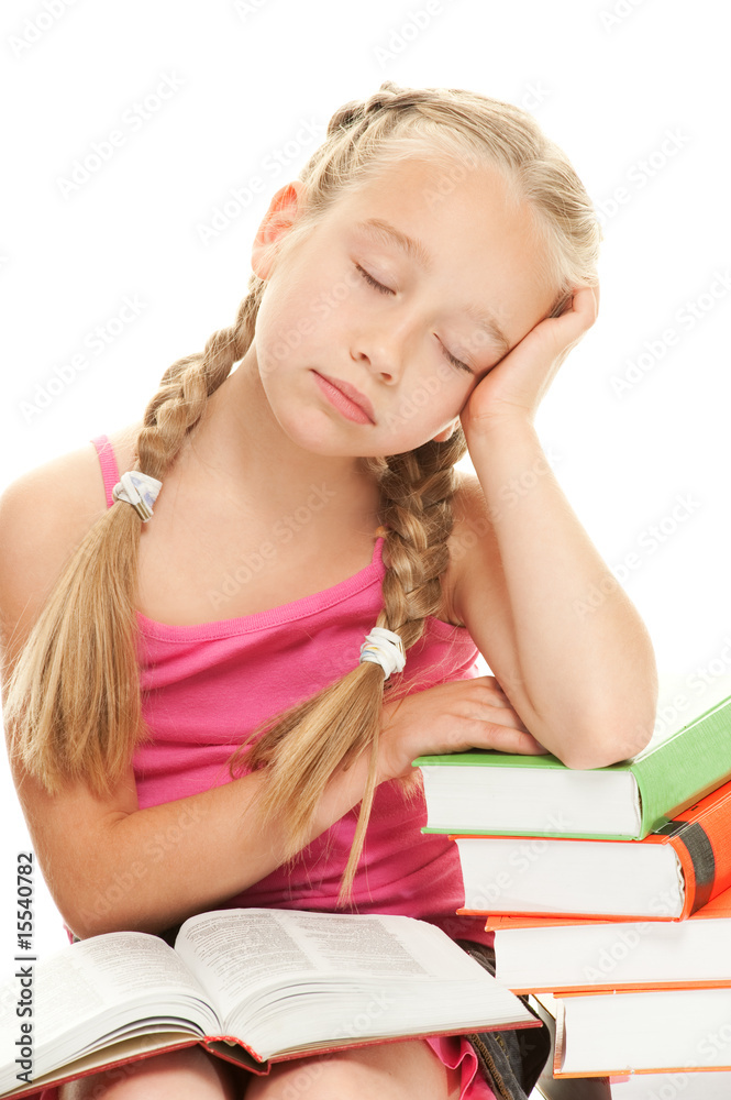 Little schoolgirl fall asleep after reading a book.... Little schoolgirl fall asleep after reading a book....