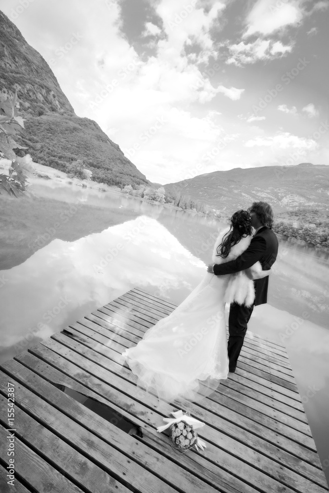 just married on a pier