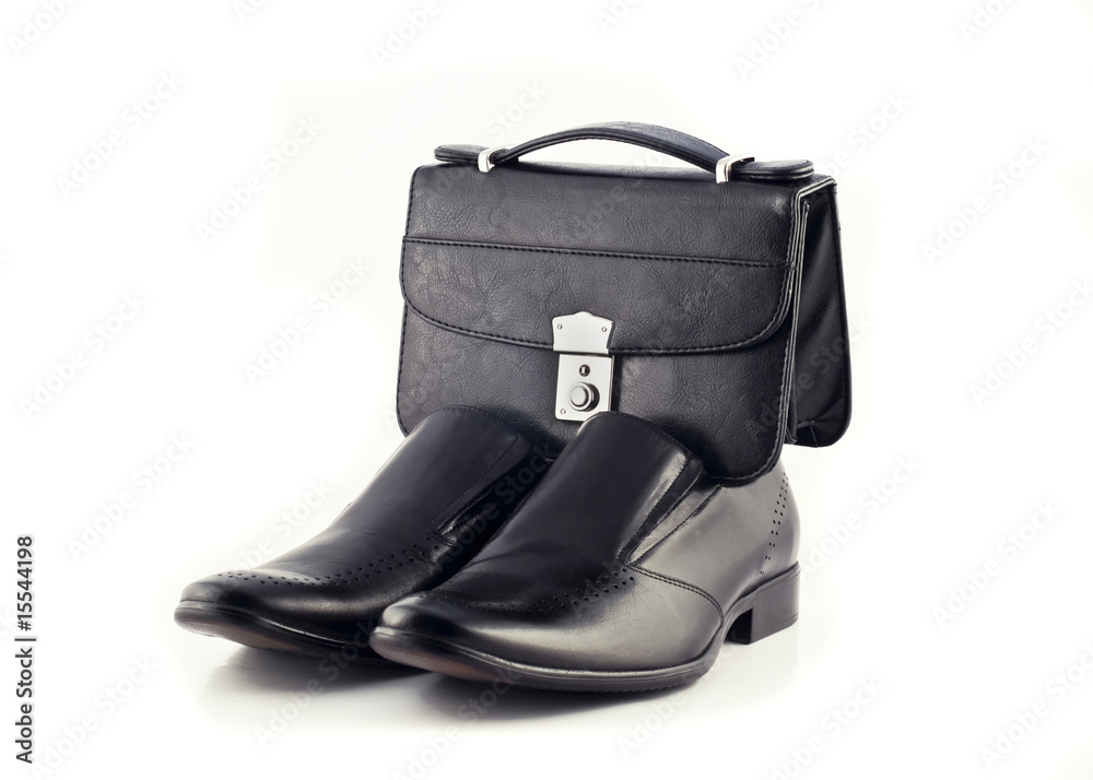 Pochette and Pair of men's classic leather shoes isolated Pochette and Pair of men's classic leather shoes isolated