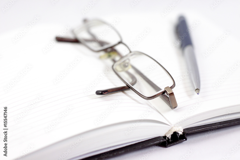 Notebook with the handle and glasses Notebook with the handle and glasses