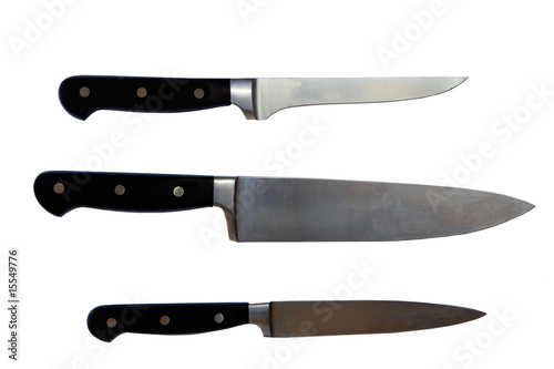 three Metal knives isolated on white background