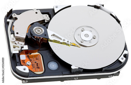 Close-up inside view of hard disk isolated on white