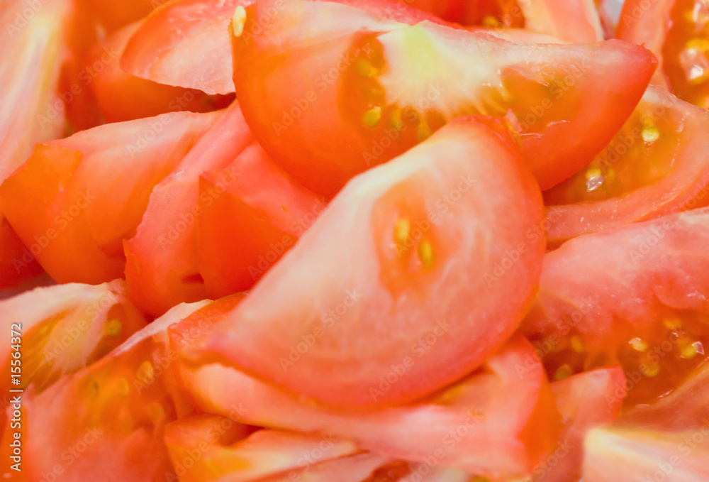 Fresh natural tomato slice to background