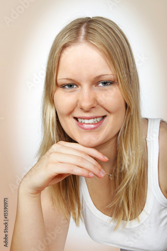 Portrai of a young lady  smiling into camera