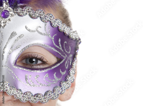 Girl in Mardi gras or Halloween mask photo