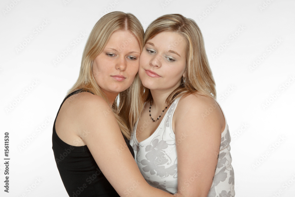 Two ladies embracing
