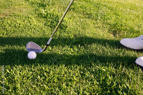 Golfer concentrating on the hole