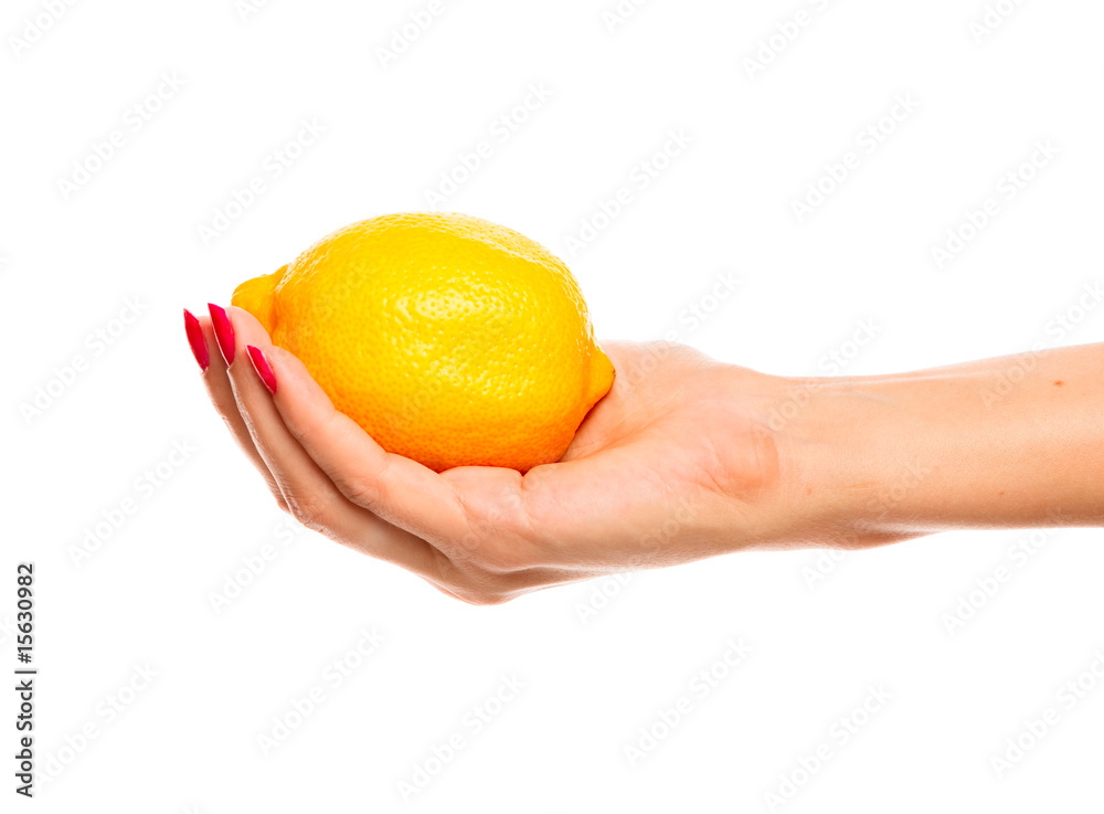 human hand holding yellow lemon human hand holding yellow lemon