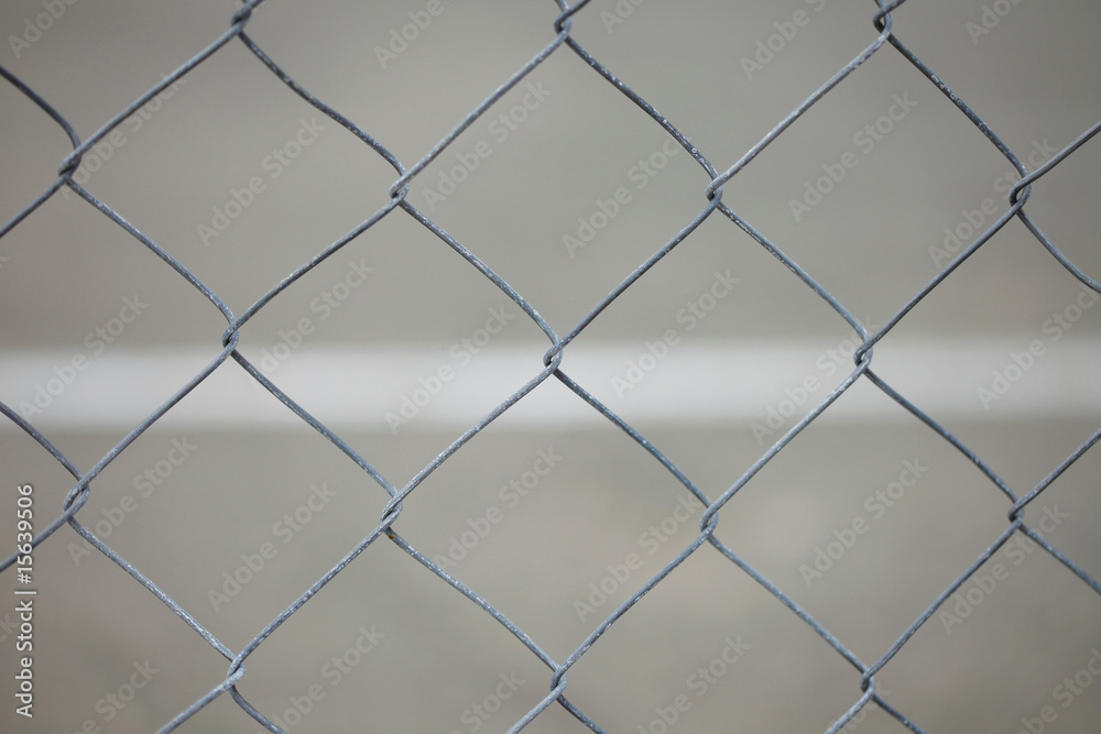 Closeup detail of a chain link fence Closeup detail of a chain link fence