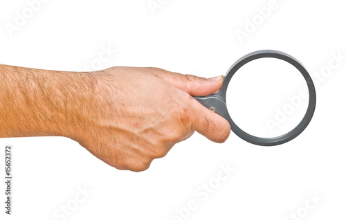 hand with magnifier glass isolated on white background