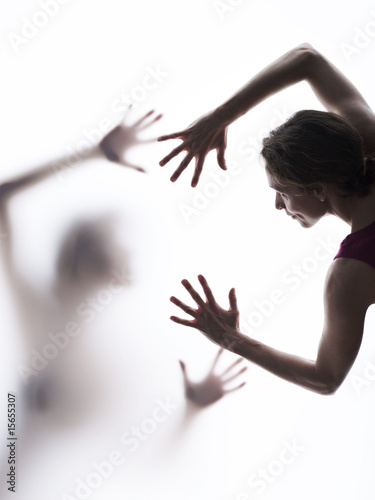 Two people reaching out to each other