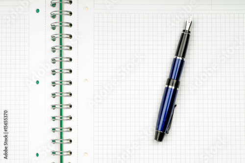 notebook and pencil on white background with clipping path © Viorel Railean
