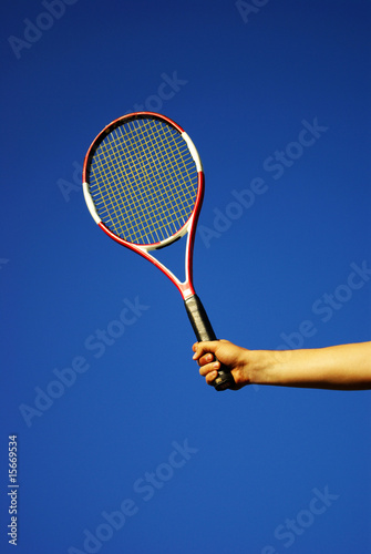 Tennis player holding racket © Karyna Chekaryova
