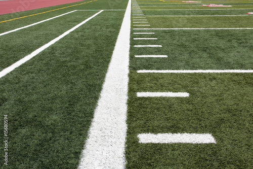 Hash marks on football field © pics721